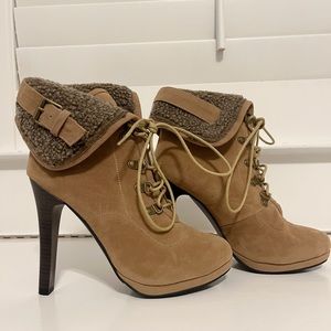 Never worn Timberland style heeled boots